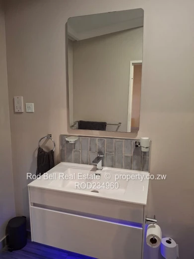 Chisipite 2-Bed Townhouse — Pool, Garden & Balcony
