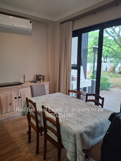 Chisipite 2-Bed Townhouse — Pool, Garden & Balcony