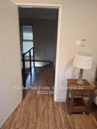 Chisipite 2-Bed Townhouse — Pool, Garden & Balcony