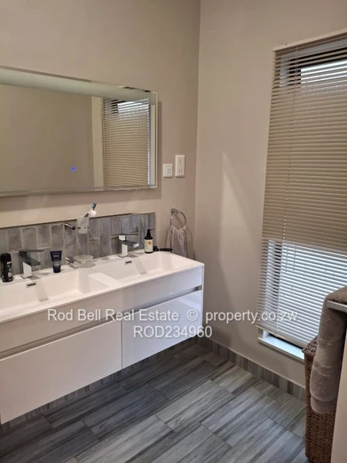 Chisipite 2-Bed Townhouse — Pool, Garden & Balcony